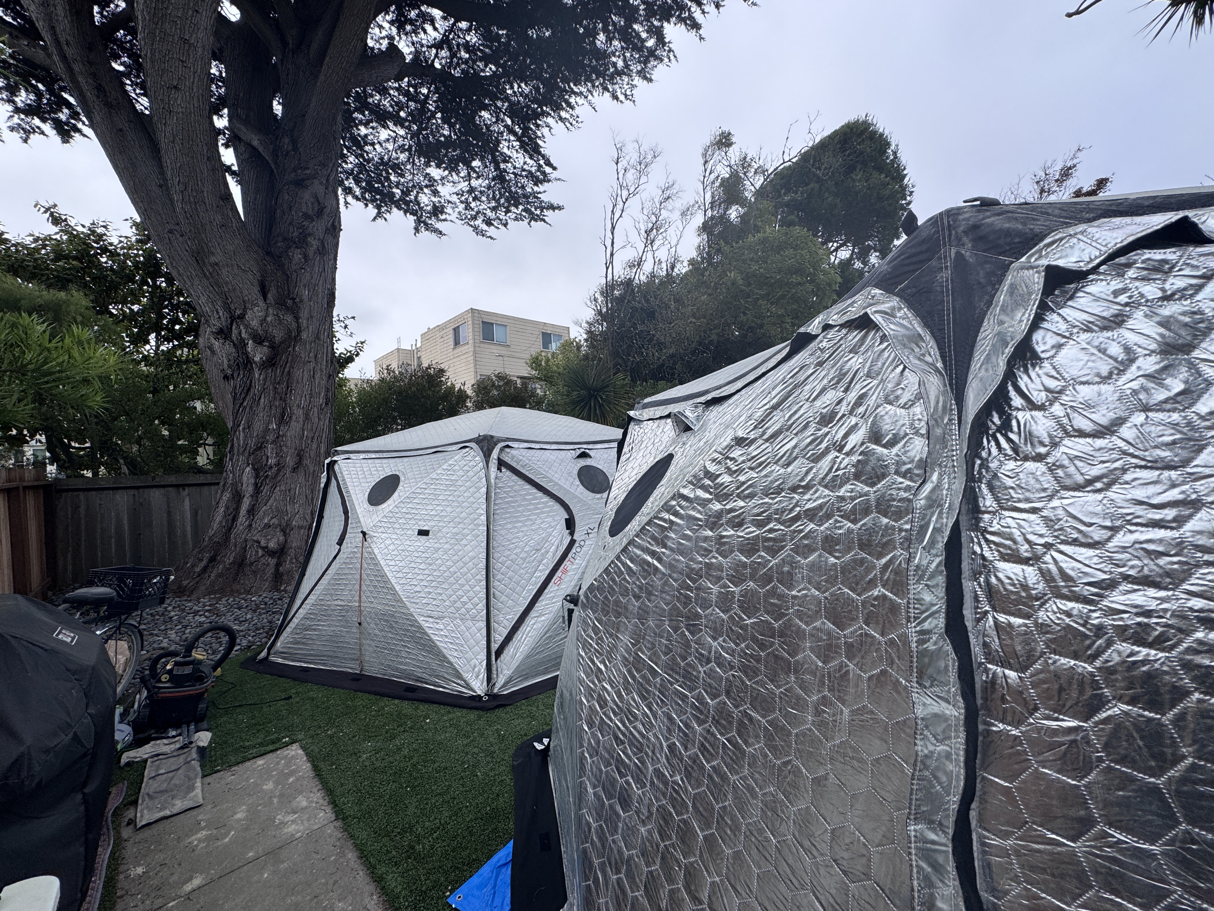 Several Shiftpods being cleaned in a local work area